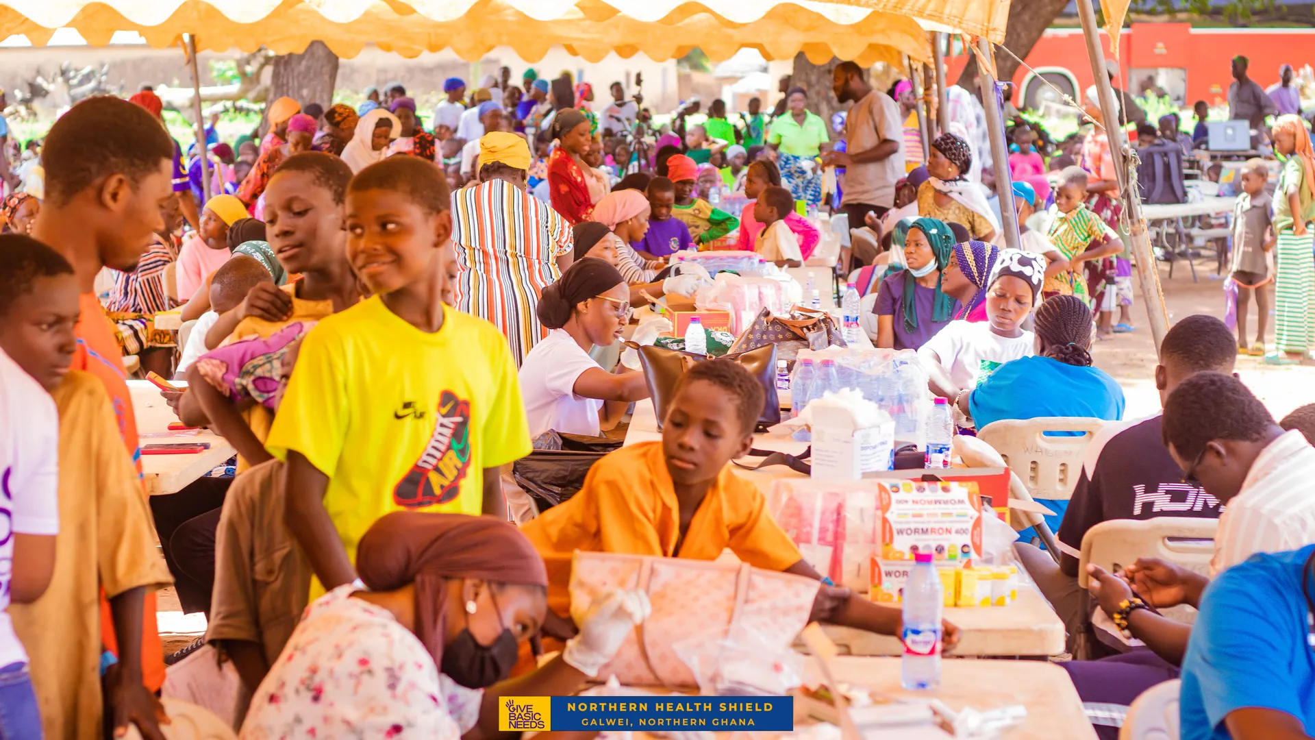 Crowds gathered for a Northern Health Shield screening day in Galwei, Northern Ghana