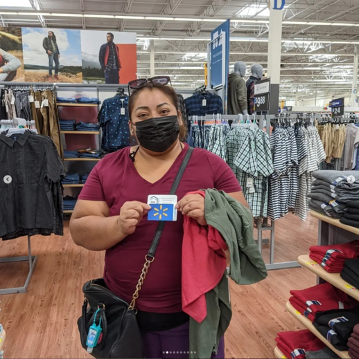 Giving Event - Person Holding Gift Card Smiling