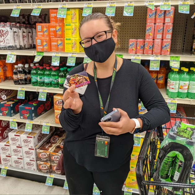Giving Event - Person Holding Gift Card Smiling