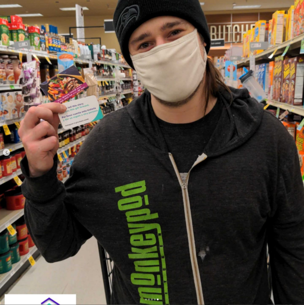 Giving Event - Person Holding Gift Card Smiling