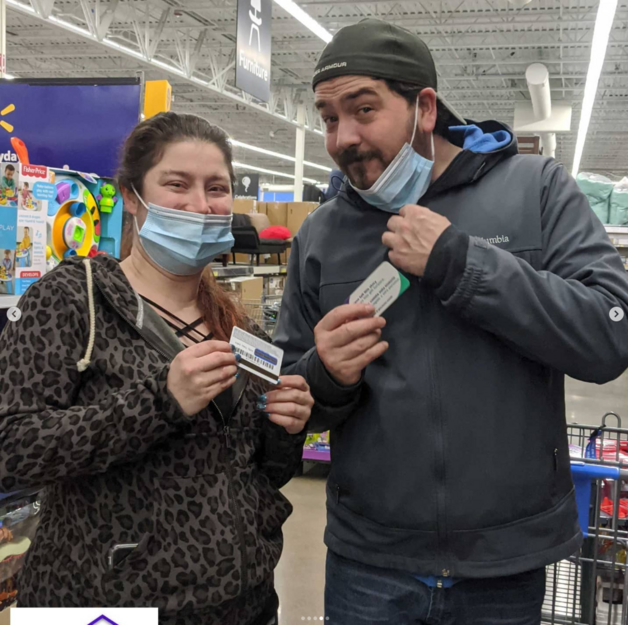 Giving Event - Friends Holding Gift Card