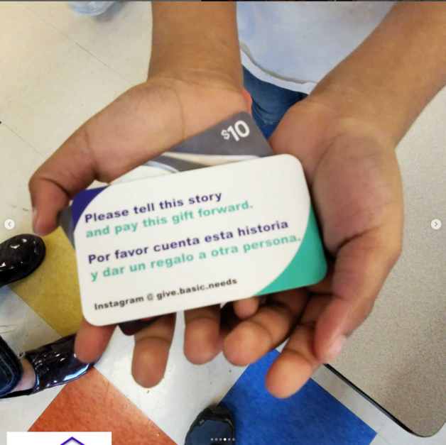 Giving Event - Child Holding Gift Card