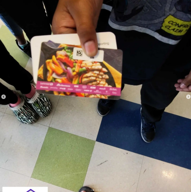 Giving Event - Child Holding Gift Card