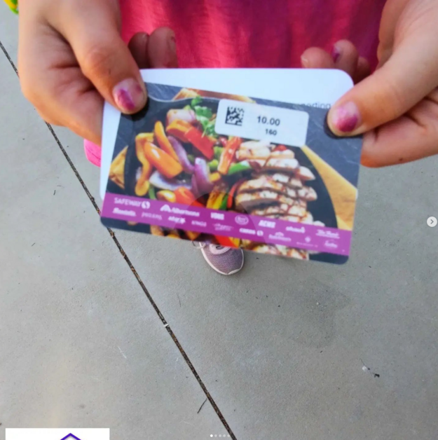 Giving Event - Child Holding Gift Card