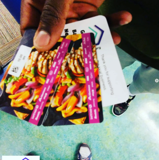 Giving Event - Child Holding & Gift Card