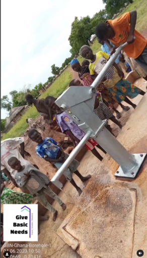 Giving Event - Youth Pumping Water