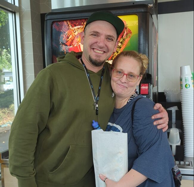 happy people who had their sandwiches paid for